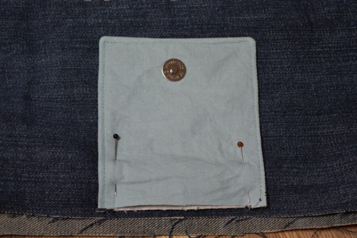 baste fabric flap closure