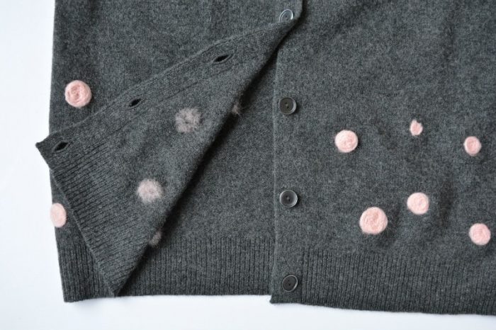 Repair a moth holed jumper using needle felt, create a stylish new look to a former sweater. Quick and easy modernisation