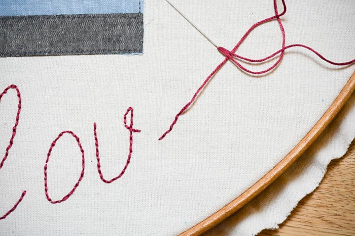 hand embroider the letters_