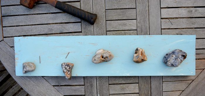 pebble-beach-art-hang-pebbles-on-plank-of-wood