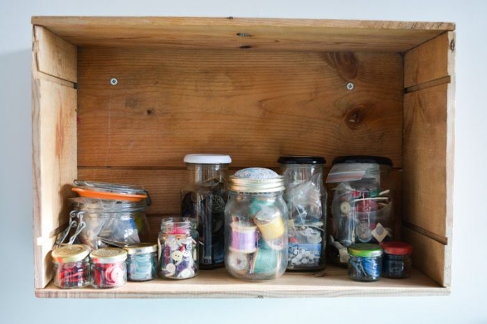 Jam jars filled with buttons, How to organize a sewing room on a budget, thrifty sewing room ideas