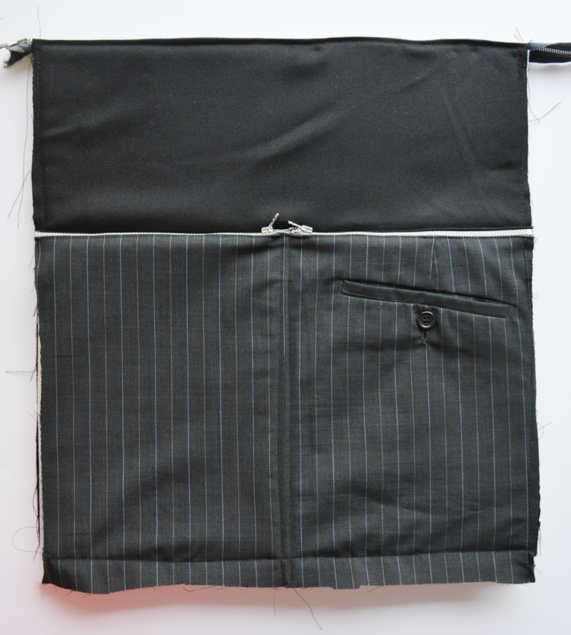 Suit trousers to create exteral zup pockets on bag