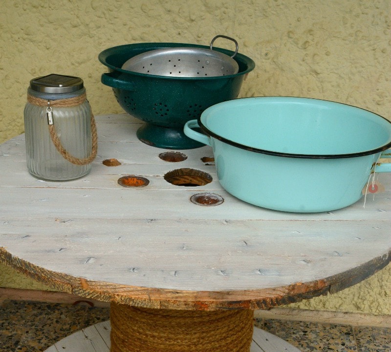 Vintage kitchen ware as plant containers